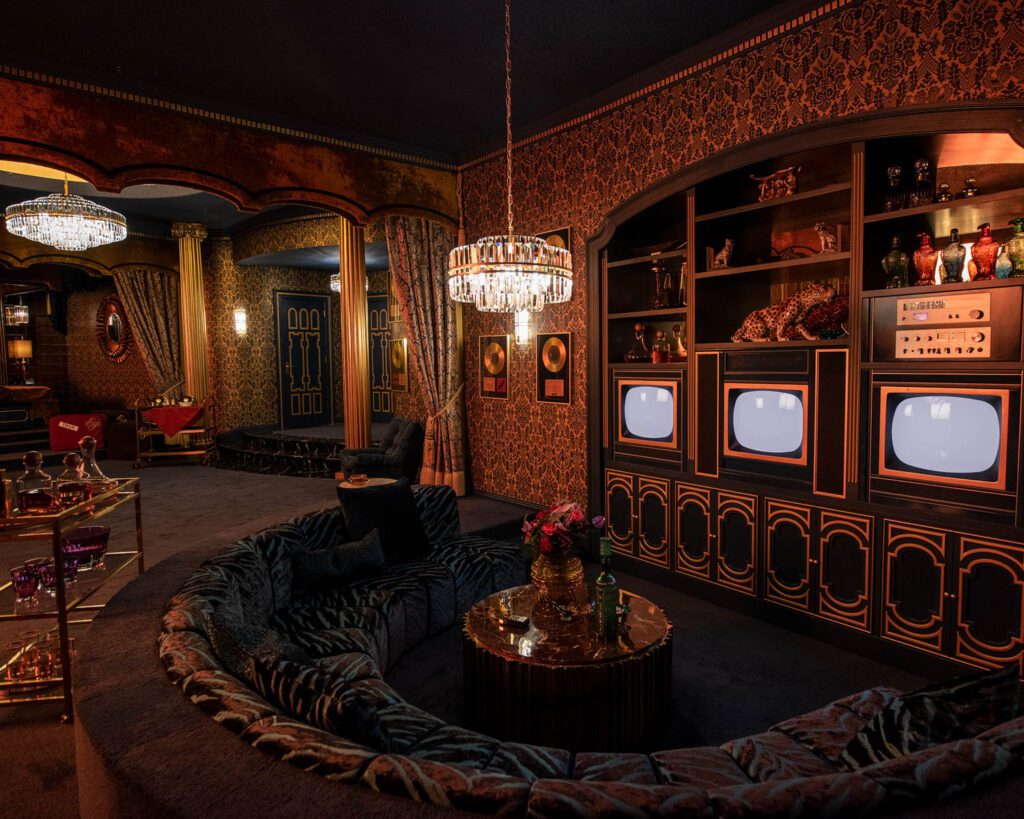 A recreation of the Elvis suite in Las Vegas with the Bengal Tiger textile on the sectional. Photography by Hugh Stewart.