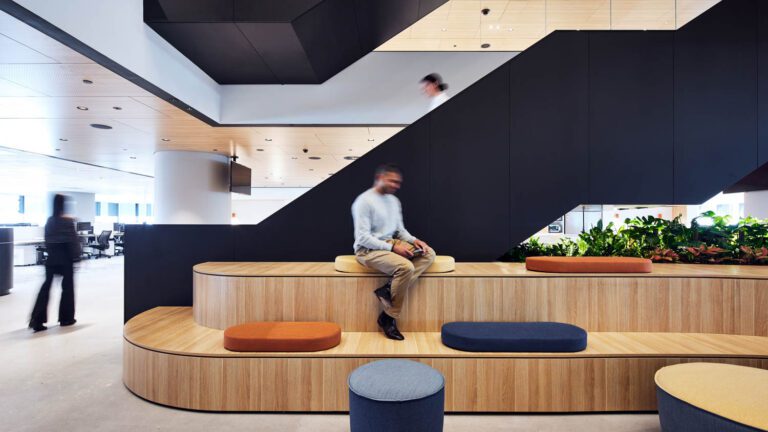 A breakout space on level 19 offers Polytec stepped seating with Euroline cushions, and Stylecraft poufs and tables.