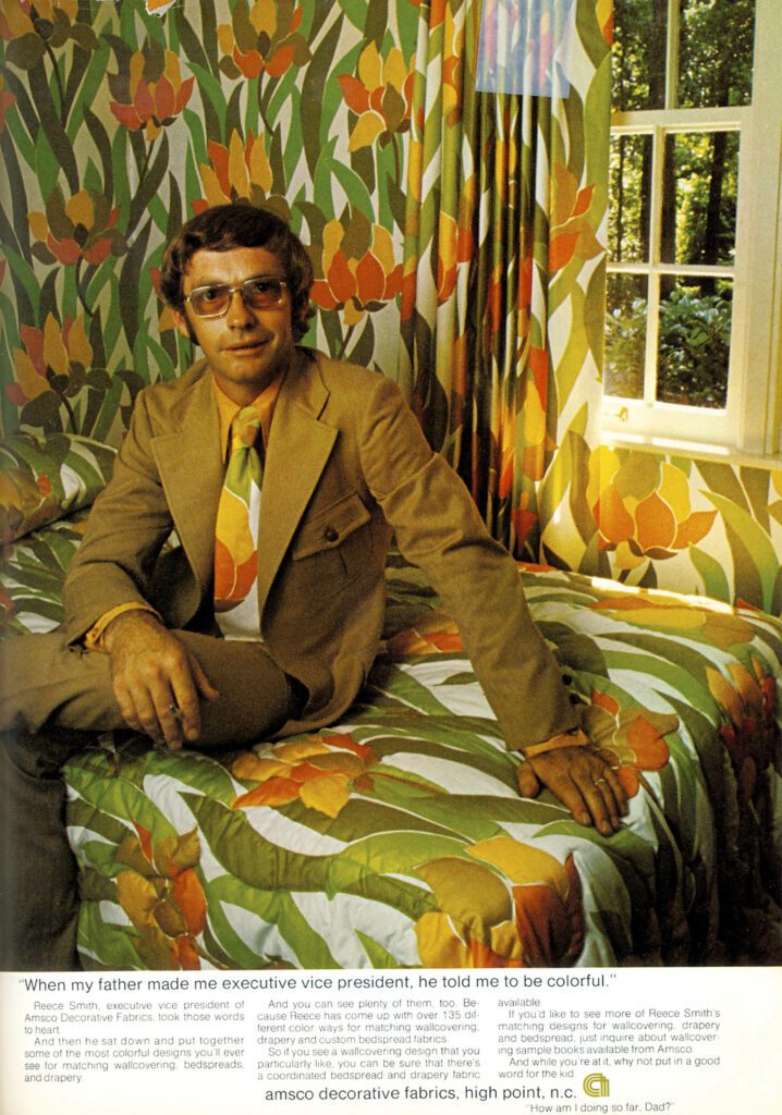 1971 - The well dressed man wears a tie that matches the bedspread.