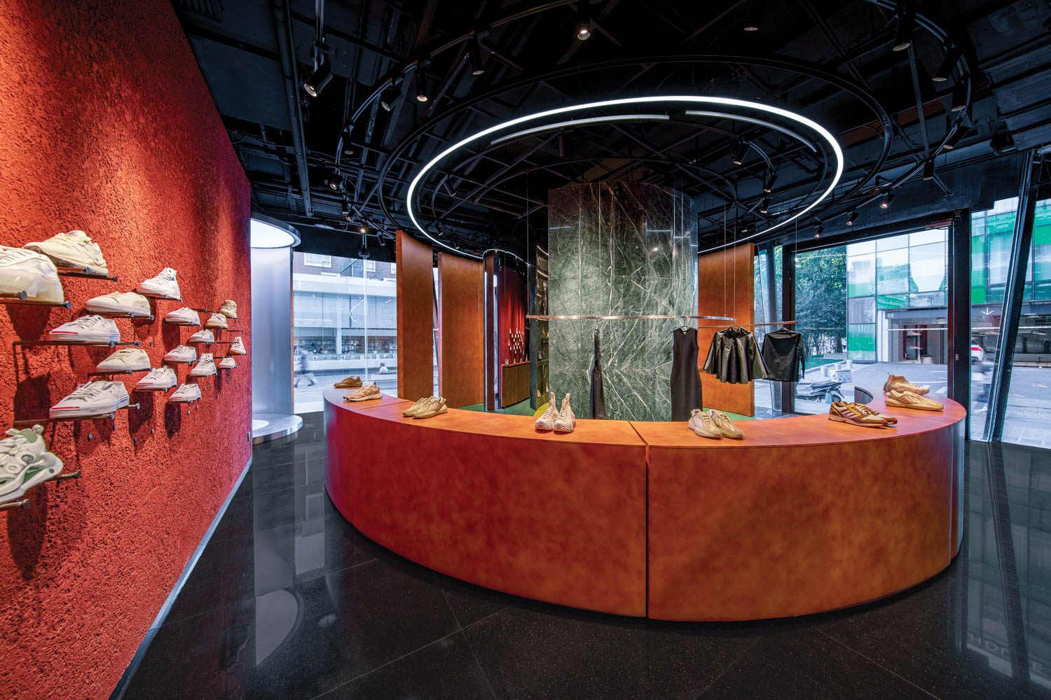 a red curved wall in KIKS Beijing by ROOI Design & Research