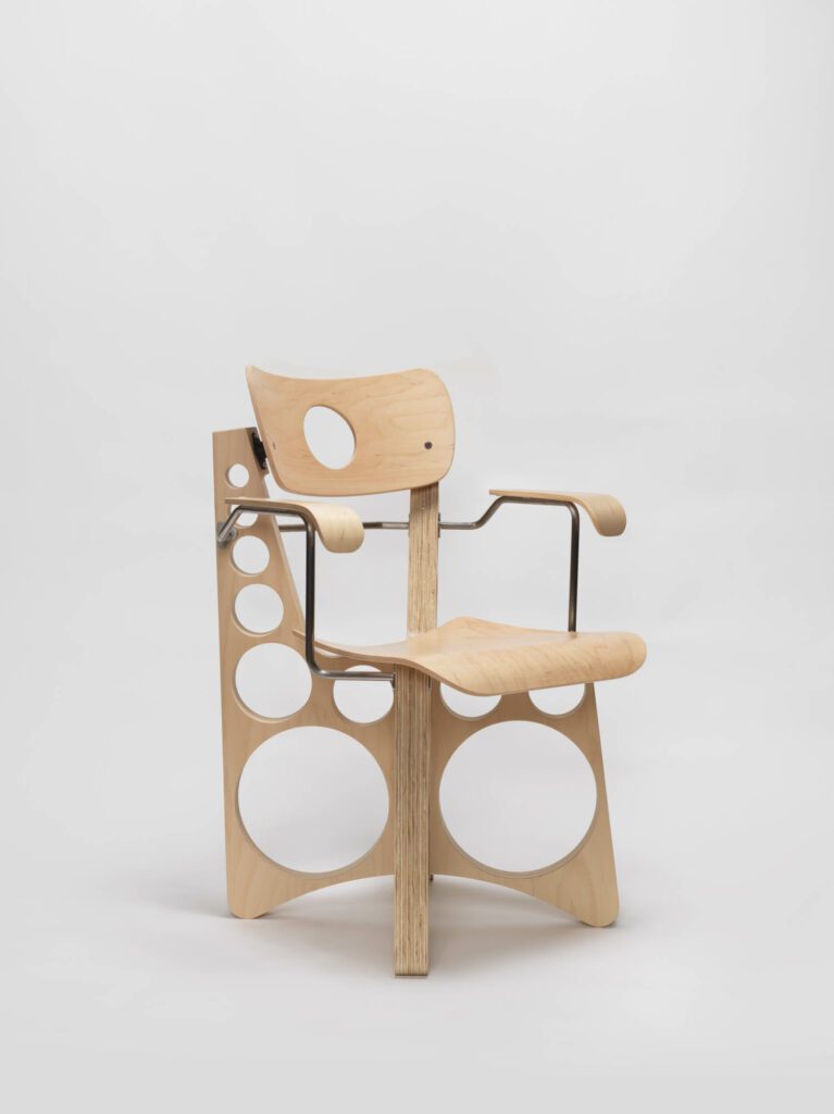 Shop Chair (with Arms), 2022, plywood, rubber flex-mounts, stainless steel screws.