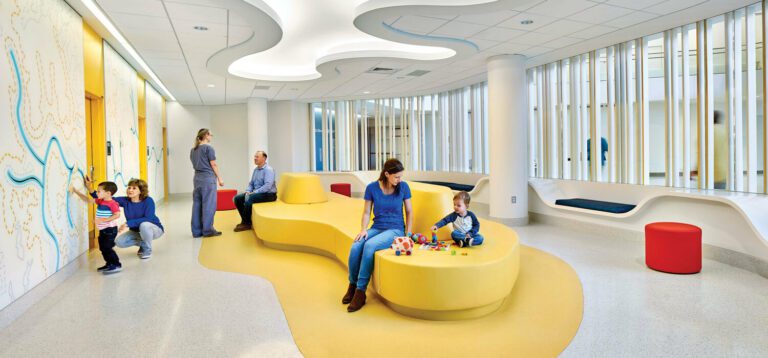 Yellow couch in the University of Virginia Hospital Designed by Perkins and Will