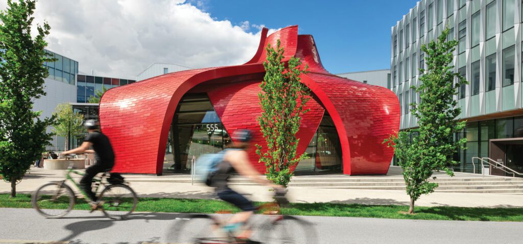 Nemesis Coffee occupies a pavilion of composite aluminum shingles and glass on the quad of Emily Carr University of Art + Design.