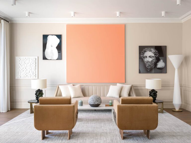 Circus Peanut, an acrylic on canvas by art collective Henry Codax, hangs above the living room’s wool-satin-upholstered custom sofa.