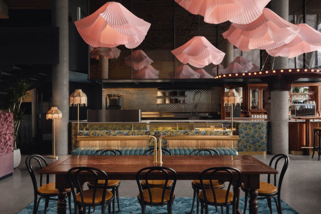 the cafe with blush-colored crinoline lamps above