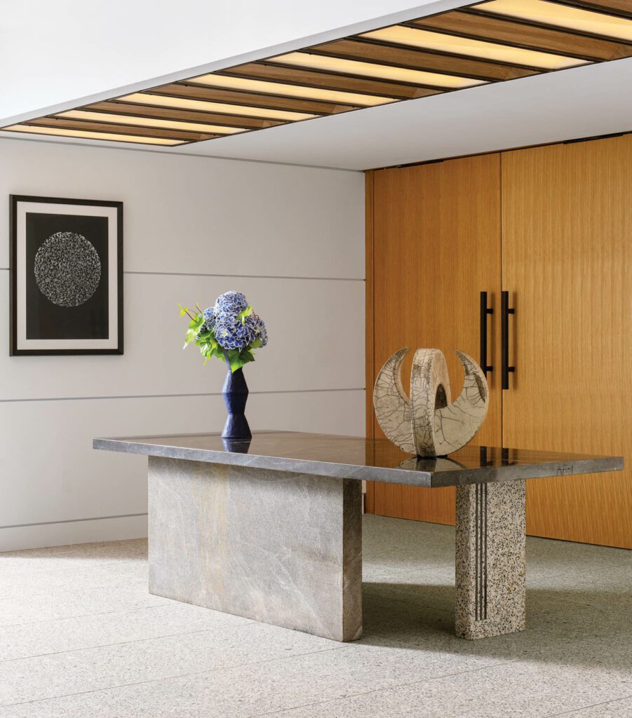 The pre-function area also features a historic Breuer granite desk, which stands on porcelain floor tile.