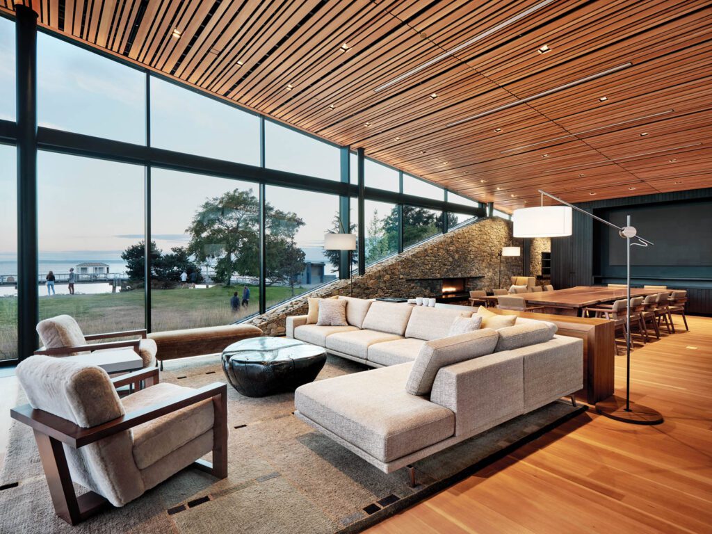 a living-room style lounge with a large glass wall