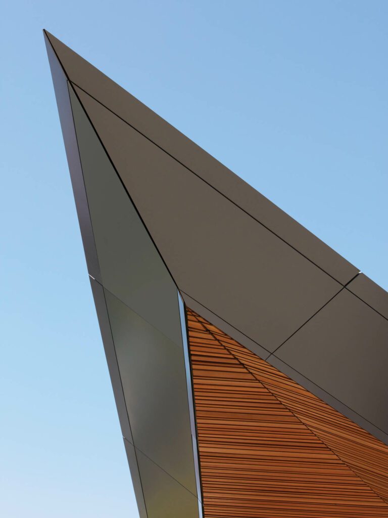 The sharply angled roof of aluminum and Douglas fir resembles a floating wing