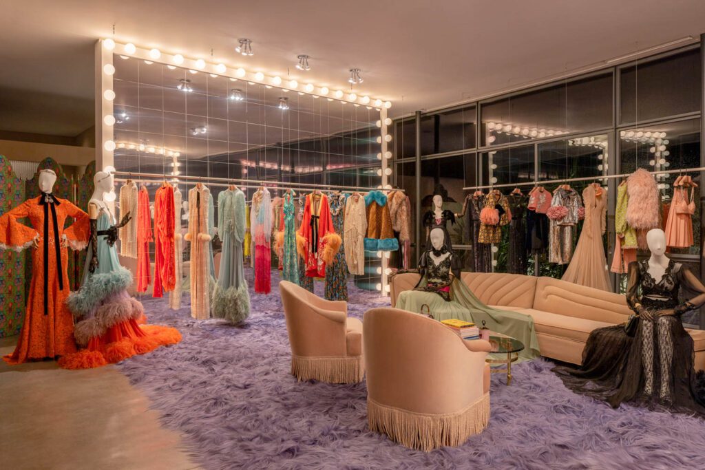 In celebration of its 100th anniversary, creative director Alessandro Michele hosted the Gucci Dallas Space featuring pieces of the Love Parade collection in a variety of tableaux amidst mid-century furnishings. 