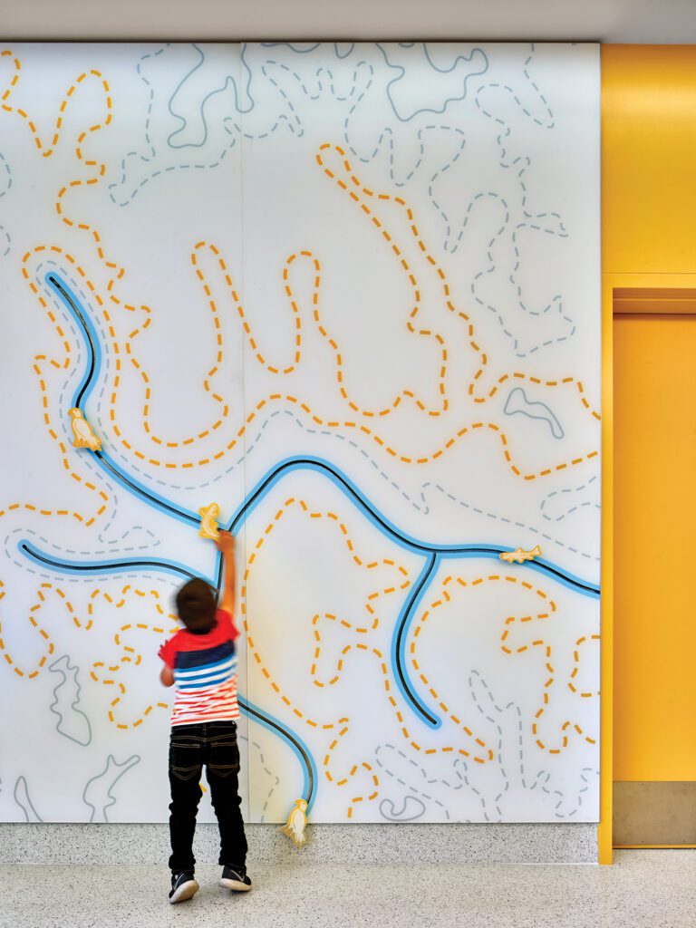 mural with yellow and blue lines.