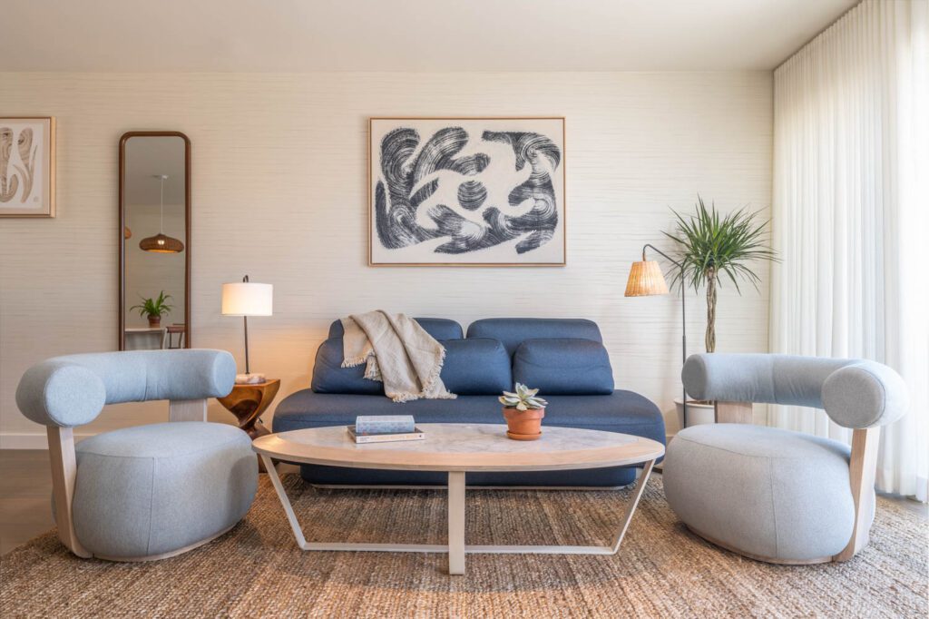 The guest suites feature jute rugs and subtle blue hues. 