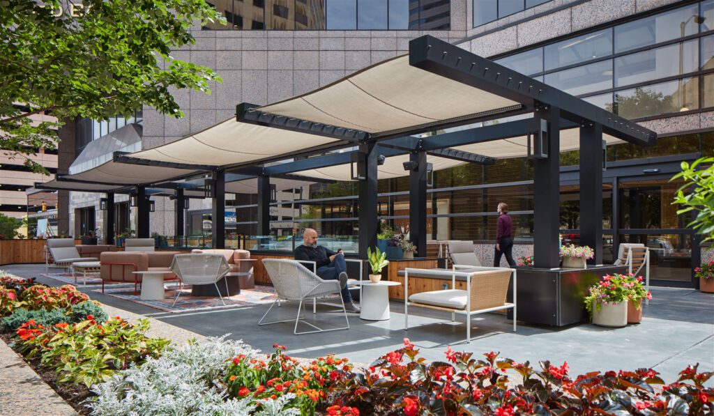 The living room-like exterior terrace lounge with Blu Dot and Andreu World furnishings offers shade via its custom aluminum canopy.